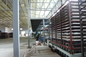 Linha de produção do painel de sanduíche do sistema hidráulico, máquina do painel do telhado do Mgo do cimento